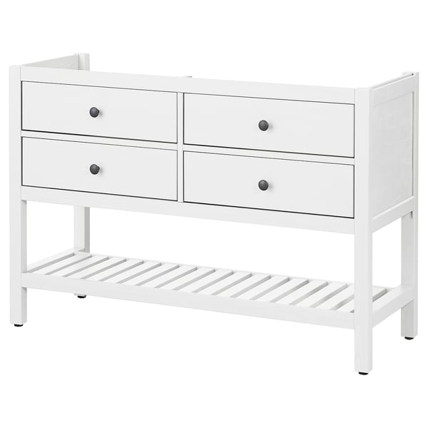 A white HEMNES wooden dresser with four drawers and an open shelf at the bottom.