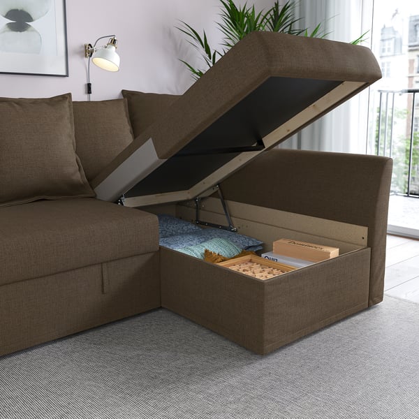 Sofa with lift-up seat for storage.