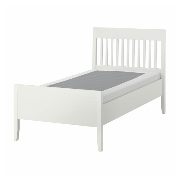 White IDANÄS bed with grey mattress. Slatted headboard and sturdy wooden frame.