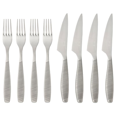 IKEA 365+ cutlery set with stainless steel forks and serrated knives. Modern design with ribbed handles for grip. Eight pieces, clean and functional.
