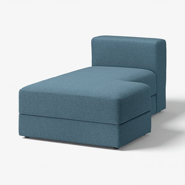 A blue JÄTTEBO chaise longue sofa module with storage. Its modern, curved design is upholstered in soft, textured fabric.