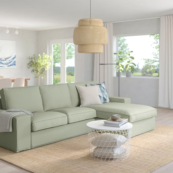 KIVIK sofa: soft green cotton, large l-shape, deep cushions, fits well in big rooms.