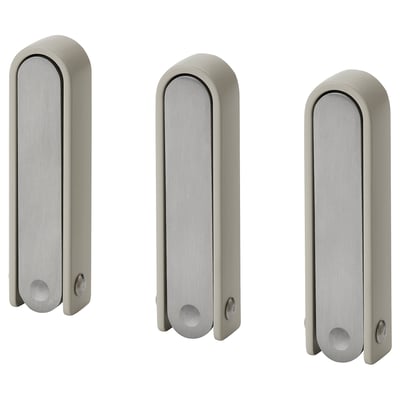 Three silver KLYKET hooks with wavy shape, perfect for hanging items, folds flat, versatile design.