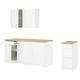 KNOXHULT white kitchen cabinets with oak countertop.