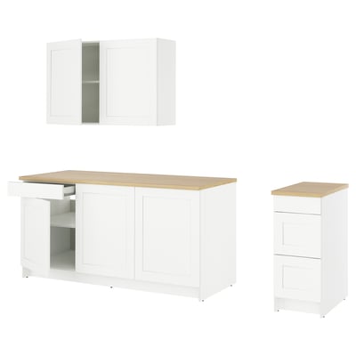 KNOXHULT white kitchen cabinets with oak countertop.