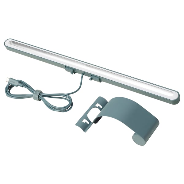 A LAGERGÅNG led lamp in teal. Its a slim, rectangular design, ideal for screen mounting. A usb-c connector and touch dimmer.