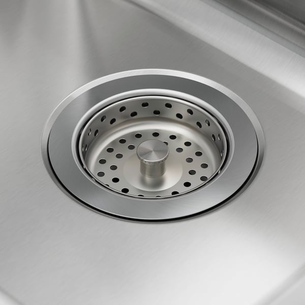 Stainless steel sink drain with strainer and stopper, sleek, modern design, high-quality finish.