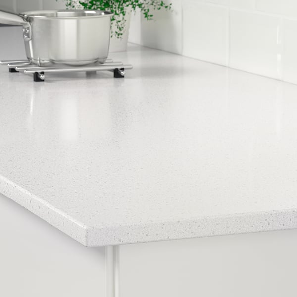 Kitchen countertop made of recycled glass, glossy white, stain-resistant, durable, non-porous.
