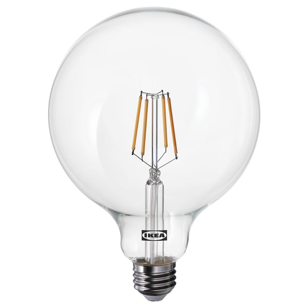 Ikea LUNNOM bulb, clear, globe-shaped, warm white led light, made of glass.