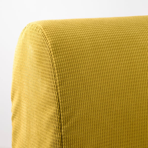 A yellow woven sofa close-up, showcasing high-quality, textured fabric. Comfortable and stylish, ideal for living spaces.