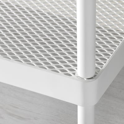Close-up of white metal mesh shoe rack, showing sturdy, powder-coated frame and durability.