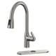 A MACKSJÖN kitchen tap in stainless steel with a high-arc, pull-down spray head. It combines sleek design with functional for easy use.