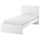 A white MALM bed with a high headboard and footboard. It a simple, modern design with clean lines and adjustable bed sides.