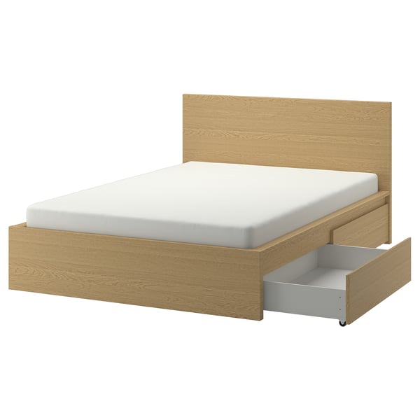 MALM bed in oak veneer storage drawers, headboard, and castor wheels for smooth operation.