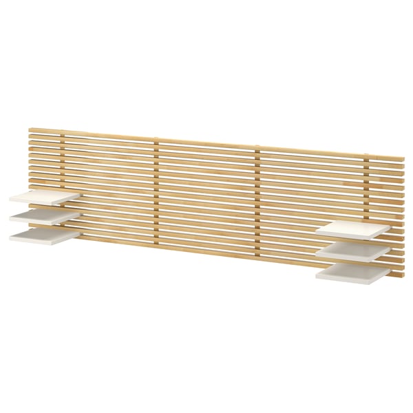 A MANDAL wooden headboard with minimalist design featuring white shelves for storage.