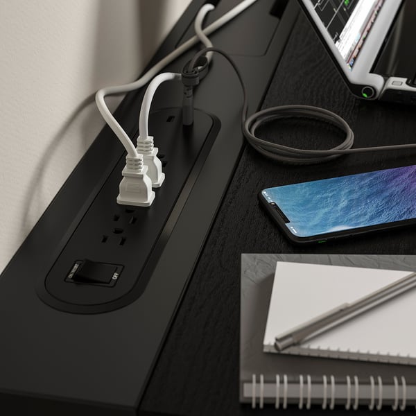 Desk with phone and notebook