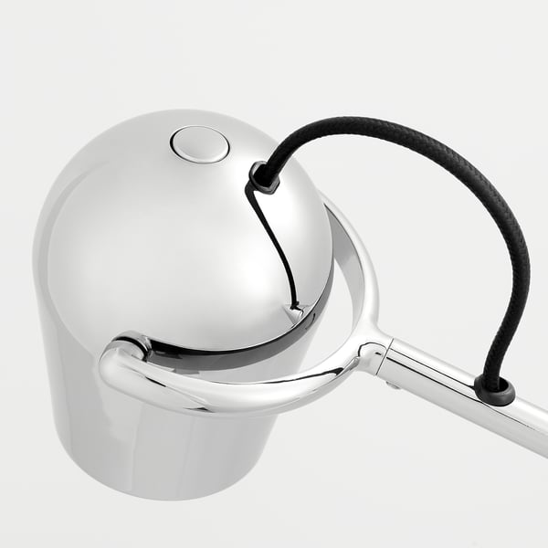 Modern chrome work lamp with adjustable joints and usb-c charging port.