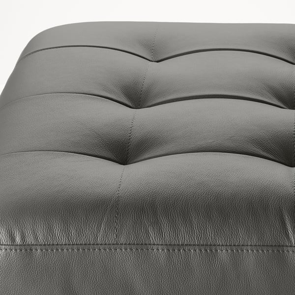 Close-up of MORABO sofas high-quality, smooth leather with elegant stitching.