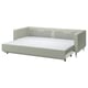 A light green MORABO sofa-bed with chrome legs, offering comfort and storage.