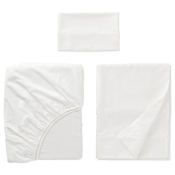 All-white bedsheet set: flat, fitted sheet, and pillowcase. Soft, sateen-woven fabric with cotton and lyocell blend.