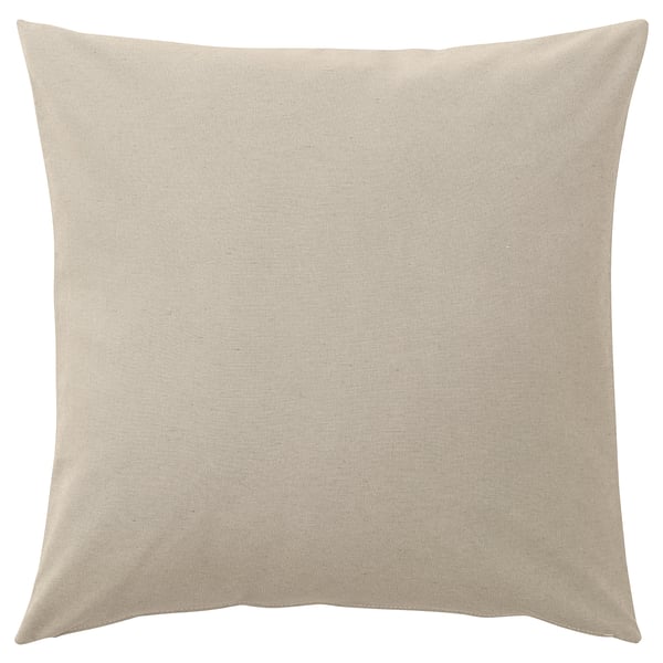 A rectangular PARADISBUSKE throw pillow in a neutral beige colour with a textured, wave-like design, made from recycled cotton and polyester.