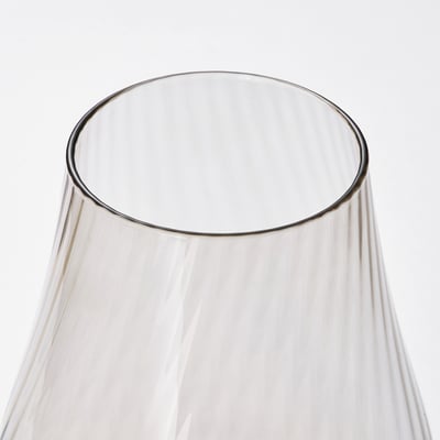 Clear glass vase with smooth, curved design, showcasing quality and simplicity.