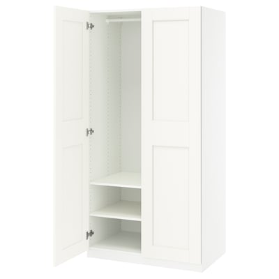 White PAX wardrobe: slim, tall, minimalist design. Soft-close doors, internal shelves.