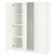 A white IKEA PAX wardrobe with open doors. It has adjustable feet and hinges with soft closing mechanisms.