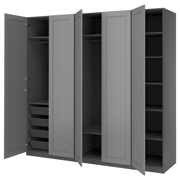 Grey PAX wardrobe with open doors, shelves, drawers, and hanging space.