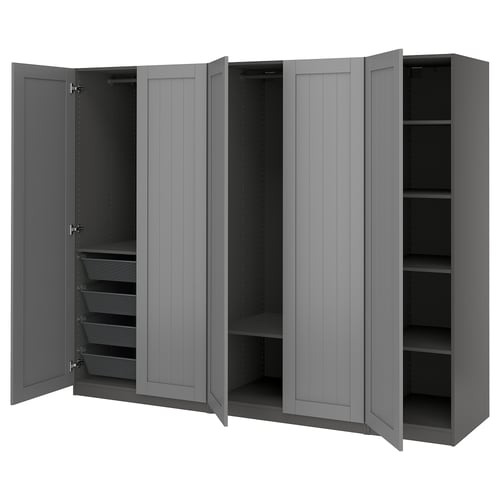 Grey PAX wardrobe with four open doors, displaying shelves and mesh baskets, mounted on the wall.