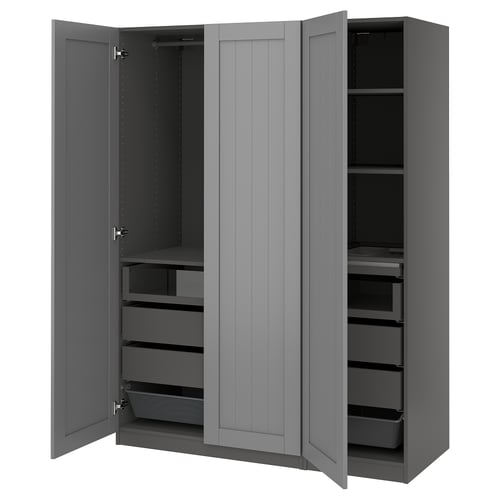 A grey PAX wardrobe with open doors, displaying drawers and shelves inside.