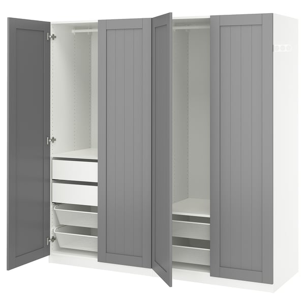 Grey PAX wardrobe with open doors, mesh drawers, and shelves.