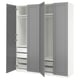 Grey PAX wardrobe with open doors, white interior, shelves, drawers, mesh baskets, and soft-close hinges.