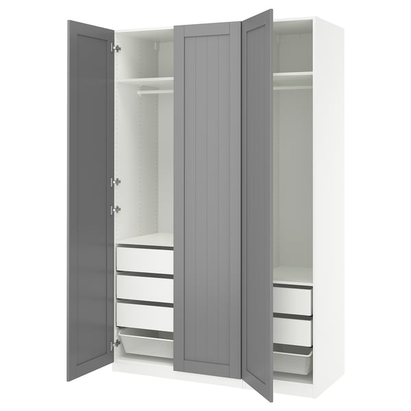 An open grey PAX wardrobe with shelves and drawers.