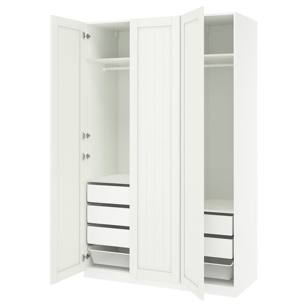 Displays a white PAX wardrobe with open doors, showing inner shelves, drawers, and a mesh basket.