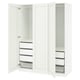 A white PAX wardrobe with open sections revealing shelves and a mesh basket.