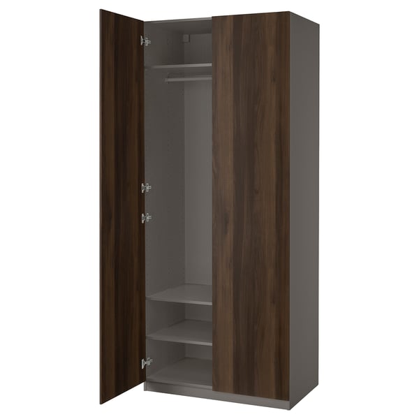 Ikea PAX wardrobe, dark brown, tall, rectangular, with 3 shelves and hanging rod.