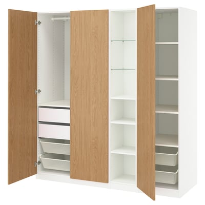 PAX wardrobe, white & oak. Open doors reveal shelves and drawers. Modern, practical design.