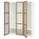 Open white PAX wardrobe with wood trim and glass doors.
