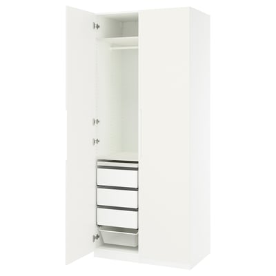 A white PAX wardrobe with one door open, revealing shelves and a mesh basket.
