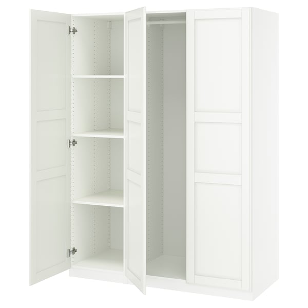 Depicts an open white PAX wardrobe with multiple shelves and no contents.