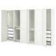 White PAX wardrobe with open doors, shelves, drawers, and compartments.