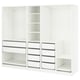 White PAX wardrobe system by IKEA, open design with shelves and drawers.
