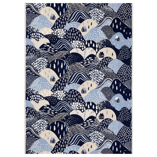 The PENDELKAKTUS fabric a mountain design in earthy blues and greys on cotton.