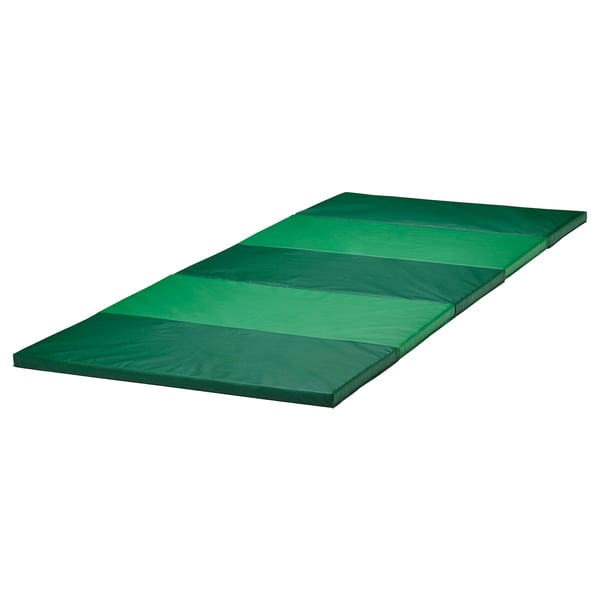 A green PLUFSIG foldable gym mat for children, soft and padded, perfect for practising and playing.
