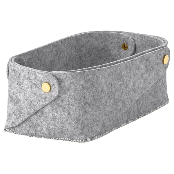 Grey PUDDA felt storage basket with brass button closure.
