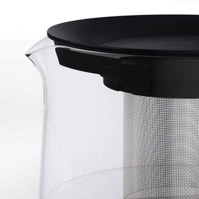 Modern glass teapot with black lid and mesh philtre, perfect for brewing loose leaf tea.