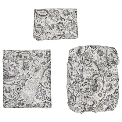RODGERSIA bedding in black & white paisley. It a comforter and sheets, with intricate floral patterns.