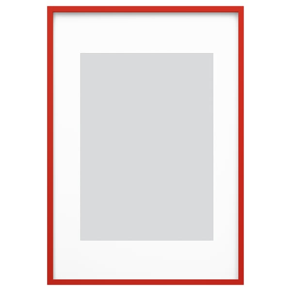 Red framed white photo display with grey inner frame.