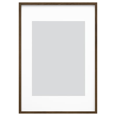 Brown wooden photo frame with a white mat, ready to hang and display pictures.